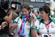 4 August 2015; Team Ireland’s Aoife Beston, left, a member of Claremorris All Stars Special Olympics Club, from Claremorris, Co. Mayo, during the homecoming. Team Ireland returns from the Special Olympics World Summer Games. Terminal 2, Dublin Airport. Picture credit: Ray McManus / SPORTSFILE