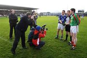 30 November 2008; Kerins O'Rahilly's captain Declan Quill and Mid Kerry captain Mike Burke shake hands alongside referee Padraig O'Sullivan before the game. Kerry Senior Football Championship Final Replay, Kerins O'Rahilly's v Mid Kerry, Fitzgerald Stadium, Killarney, Co. Kerry. Picture credit: Stephen McCarthy / SPORTSFILE