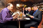 8 December 2008; Jerry O'Sullivan, left, of Newstalk, Bill O'Herlihy, of O'Herlihy Communications, and Paul Dempsey, of Setanta Sports, in conversation at the Judges Dinner to decide the shortlist for this year’s William Hill Irish Sports Book of the Year Award. Ely Restaurant, IFSC, Dublin. Picture credit: Brendan Moran / SPORTSFILE
