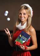 9 December 2008; Model Ruth O'Neill at the launch of the Tracker Golfer’s Diary by Dr. Liam Hennessy, the fitness guru behind three-time major golf champion, Padraig Harrington. An ideal gift for Christmas and available online at www.sporttracker.ie, the Tracker Golfer’s Diary outlines the practice and preparation that gave Harrington his competitive edge. In addition, it provides a comprehensive performance analysis system enabling the club golfer to track their progress. D4 Hotel, Ballsbridge, Dublin. Picture credit: Brendan Moran / SPORTSFILE
