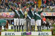 7 August 2015; The Winning Ireland team, from left to right, Greg Patrick Broderick, Darragh Kenny, Chefd'Equipe Robert Splaine, Bertram Allen and Cian O'Connor celebrate with the Aga Khan Cup after their victory in the Furusiyya FEI Nations Cup during the Discover Ireland Dublin Horse Show 2015. RDS, Ballsbridge, Dublin. Picture credit: Cody Glenn / SPORTSFILE