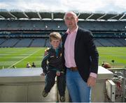 8 August 2015; Tipperary great Eoin Kelly in attendance at today's‚ Bord Gáis Energy Legends Tour at Croke Park, where he relived some of most memorable moments from his playing career, with Micheál Ó Laoghaire, aged 5, from Ennis, Co. Clare. All Bord Gáis Energy Legends Tours include a trip to the GAA Museum, which is home to many exclusive exhibits, including the official GAA Hall of Fame. For booking and ticket information about the GAA legends for this summer visit www.crokepark.ie/gaa-museum. Croke Park, Dublin. Picture credit: Dáire Brennan / SPORTSFILE