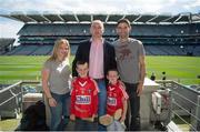 8 August 2015; Tipperary great Eoin Kelly in attendance at today's‚ Bord Gáis Energy Legends Tour at Croke Park, where he relived some of most memorable moments from his playing career, pictured with the Murphy's from Ballincollig, Co. Cork, Annette, Éamonn, and their sons Tadhg, aged 6, and Dáithí, aged 8. All Bord Gáis Energy Legends Tours include a trip to the GAA Museum, which is home to many exclusive exhibits, including the official GAA Hall of Fame. For booking and ticket information about the GAA legends for this summer visit www.crokepark.ie/gaa-museum. Croke Park, Dublin. Picture credit: Dáire Brennan / SPORTSFILE