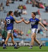 8 August 2015; Kerry's Michael Brennan celebrates with team-mate Tadhg Morley, right, after the game. GAA Football All-Ireland Junior Championship Final, Kerry v Mayo, Croke Park, Dublin. Picture credit: Sam Barnes / SPORTSFILE