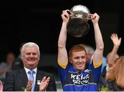 8 August 2015; Kerry captain Alan O'Donoghue lifts the cup following his side's victory, in the compnay of Uachtarán Chumann Lúthchleas Gael Aogán Ó Fearghail, left. GAA Football All-Ireland Junior Championship Final. Kerry v Mayo, Croke Park, Dublin. Picture credit: Stephen McCarthy / SPORTSFILE