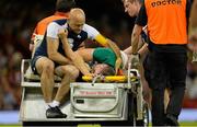 8 August 2015; Ireland's Tommy O'Donnell leaves the pitch on a stretcher accompanied by irish team doctor Dr. Eanna Falvey. Rugby World Cup Warm-Up Match, Wales v Ireland, Millennium Stadium, Cardiff, Wales. Picture credit: Brendan Moran / SPORTSFILE