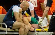 8 August 2015; Ireland's Tommy O'Donnell leaves the pitch on a stretcher accompanied by irish team doctor Dr. Eanna Falvey. Rugby World Cup Warm-Up Match, Wales v Ireland, Millennium Stadium, Cardiff, Wales. Picture credit: Brendan Moran / SPORTSFILE