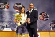 12 December 2008; Ireland's Katie Taylor with her father and coach Peter after receiveing her AIBA Female Boxer of the Year award during the AIBA Awards Ceremony and Forum. Amphitheatre, Crowne Plaza Hotel, Moscow-World Trade Centre, Krasnopresnenskaya 12, Moscow, Russia. Picture credit: SPORTSFILE / Courtesy of AIBA