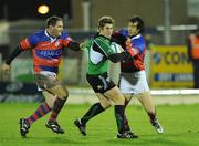 12 December 2008; Ian Keatley, Connacht, is tackled by Matteo Sclosa, left and German Bustos, Rovigo. European Challenge Cup, Pool 1, Round 4, Connacht v Rovigo, Sportsground, Galway. Picture credit: Matt Browne / SPORTSFILE