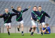 15 December 2008; Scoil Aine, Lucan, players, from left, Sean Murtagh, Shane Maloney, Sean Maguire and Darren Gavin celebrate at the final whistle after victory over Star of the Sea. Allianz Cumann na mBunscol Football Finals 2008, Corn Clanna Gael Final, Scoil Aine, Lucan v Star of The Sea, Sandymount. Croke Park, Dublin. Picture credit: Brendan Moran / SPORTSFILE