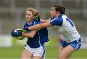 8 August 2015; Roisin O'Keeffe, Cavan, in action against Ciara McDermott, Monaghan. TG4 Ladies Football All-Ireland Senior Championship Qualifier, Round 2, Cavan v Monaghan, Kingspan Breffni Park, Cavan. Picture credit: Oliver McVeigh / SPORTSFILE