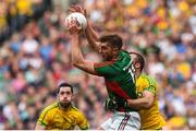 8 August 2015; Aidan O'Shea, Mayo, in action against Neil McGee, Donegal. GAA Football All-Ireland Senior Championship Quarter-Final. Donegal v Mayo, Croke Park, Dublin. Picture credit: Stephen McCarthy / SPORTSFILE