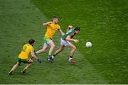 8 August 2015; Jason Doherty, Mayo, in action against Paddy McGrath, left, and Christy Toye, Donegal. GAA Football All-Ireland Senior Championship Quarter-Final, Donegal v Mayo, Croke Park, Dublin. Picture credit: Dáire Brennan / SPORTSFILE