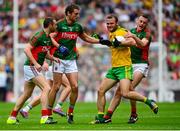 8 August 2015; Neil McGee, Donegal, in action against Mayo's, from left, Keith Higgins, Tom Parsons and Diarmuid O'Connor. GAA Football All-Ireland Senior Championship Quarter-Final, Donegal v Mayo. Croke Park, Dublin. Picture credit: Piaras Ó Mídheach / SPORTSFILE