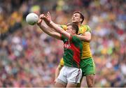 8 August 2015; Cillian O'Connor, Mayo, in action against Éamonn McGee, Donegal. GAA Football All-Ireland Senior Championship Quarter-Final. Donegal v Mayo, Croke Park, Dublin. Picture credit: Stephen McCarthy / SPORTSFILE