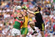 8 August 2015; Aidan O'Shea, Mayo, in action against Paul Durcan, left, and Neil McGee, Donegal. GAA Football All-Ireland Senior Championship Quarter-Final. Donegal v Mayo, Croke Park, Dublin. Picture credit: Stephen McCarthy / SPORTSFILE