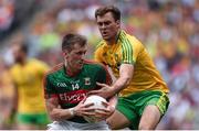 8 August 2015; Cillian O'Connor, Mayo, in action against Éamonn McGee, Donegal. GAA Football All-Ireland Senior Championship Quarter-Final. Donegal v Mayo, Croke Park, Dublin. Picture credit: Stephen McCarthy / SPORTSFILE