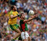 8 August 2015; Aidan O'Shea, Mayo, in action against Neil McGee, Donegal. GAA Football All-Ireland Senior Championship Quarter-Final, Donegal v Mayo, Croke Park, Dublin. Picture credit: Sam Barnes / SPORTSFILE
