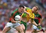 8 August 2015; Diarmuid OConnor, Mayo, in action against Anthony Thompson, Donegal. GAA Football All-Ireland Senior Championship Quarter-Final, Donegal v Mayo, Croke Park, Dublin. Picture credit: Ray McManus / SPORTSFILE