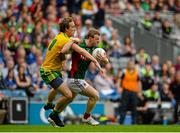 8 August 2015; Colm Boyle, Mayo, is tackled by Hugh McFadden, Donegal. GAA Football All-Ireland Senior Championship Quarter-Final, Donegal v Mayo, Croke Park, Dublin. Picture credit: Sam Barnes / SPORTSFILE