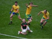 8 August 2015; Colm Boyle, Mayo, in action against Donegal players, left to right, Paddy McGrath, Hugh McFadden, and Colm McFadden. GAA Football All-Ireland Senior Championship Quarter-Final, Donegal v Mayo, Croke Park, Dublin. Picture credit: Dáire Brennan / SPORTSFILE