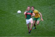 8 August 2015; Cillian O'Connor, Mayo, in action against Éamonn McGee, Donegal. GAA Football All-Ireland Senior Championship Quarter-Final, Donegal v Mayo, Croke Park, Dublin. Picture credit: Dáire Brennan / SPORTSFILE