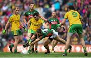 8 August 2015; Mark McHugh, Donegal, has his shot blocked by Barry Moran, Mayo. GAA Football All-Ireland Senior Championship Quarter-Final. Donegal v Mayo, Croke Park, Dublin. Picture credit: Stephen McCarthy / SPORTSFILE