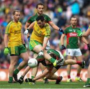 8 August 2015; Mark McHugh, Donegal, has his shot blocked by Barry Moran, Mayo. GAA Football All-Ireland Senior Championship Quarter-Final. Donegal v Mayo, Croke Park, Dublin. Picture credit: Stephen McCarthy / SPORTSFILE