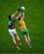 8 August 2015; Martin McElhiney, Donegal, in action against Séamus O'Shea, Mayo. GAA Football All-Ireland Senior Championship Quarter-Final, Donegal v Mayo, Croke Park, Dublin. Picture credit: Dáire Brennan / SPORTSFILE