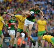 8 August 2015; Seamus O'Shea, Mayo, is tackled by Anthony Thompson, Donegal. GAA Football All-Ireland Senior Championship Quarter-Final, Donegal v Mayo, Croke Park, Dublin. Picture credit: Sam Barnes / SPORTSFILE