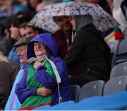 8 August 2015; Supporters shelter from the rain during the game. GAA Football All-Ireland Senior Championship Quarter-Final, Donegal v Mayo. Croke Park, Dublin. Picture credit: Piaras Ó Mídheach / SPORTSFILE