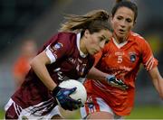 8 August 2015; Karen Hegarty, Westmeath, in action against Sharon Reel, Armagh. TG4 Ladies Football All-Ireland Senior Championship Qualifier, Round 2, Armagh v Westmeath, Kingspan Breffni Park, Cavan. Picture credit: Oliver McVeigh / SPORTSFILE