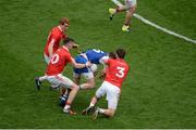 8 August 2015; Tyrone players, left to right, Peter Harte, Richie Donnelly, and Ronan McNamee, pull down Conor McManus, Monaghan. GAA Football All-Ireland Senior Championship Quarter-Final, Monaghan v Tyrone, Croke Park, Dublin. Picture credit: Dáire Brennan / SPORTSFILE