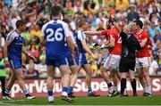 8 August 2015; Darren Hughes, Monaghan, left, receives a red card from referee Marty Duffy. GAA Football All-Ireland Senior Championship Quarter-Final, Monaghan v Tyrone. Croke Park, Dublin. Picture credit: Stephen McCarthy / SPORTSFILE
