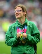 8 August 2015; Team Ireland's Rachel Ryan, a member of Ormond Special Olympics Club, from Templemore, Co. Tipperary, who won a Silver medal in the 100m, a Gold in the 400m and a Silver in the Relay, adopts a Usain Bolt pose as the Special Olympics athletes are presented to the attendees during half time. GAA Football All-Ireland Senior Championship Quarter-Final, Donegal v Mayo, Croke Park, Dublin. Picture credit: Piaras Ó Mídheach / SPORTSFILE