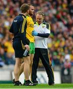 8 August 2015; Neil McGee, is helped off the field after picking up an injury. GAA Football All-Ireland Senior Championship Quarter-Final, Donegal v Mayo. Croke Park, Dublin. Picture credit: Piaras Ó Mídheach / SPORTSFILE