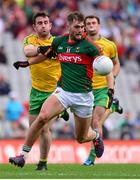 8 August 2015; Aidan O'Shea, Mayo, in action against Patrick McBrearty, Donegal. GAA Football All-Ireland Senior Championship Quarter-Final, Donegal v Mayo, Croke Park, Dublin. Picture credit: Piaras Ó Mídheach / SPORTSFILE