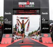 9 August 2015; Denis Chevrot, France, fought off stiff competition to take the gold medal at today’s inaugural IRONMAN 70.3 Dublin. Dublin City Council hosted the competition which saw over 2500 athletes complete a 1.2 mile swim in Scotsman’s Bay in Dun Laoghaire, before mounting their bikes to travel through Dublin and west of the city for a 56 mile cycle, to return to the Phoenix Park for the 13.1 mile half-marathon. 1,500 Irish athletes took part in today’s event and 1,000 international athletes from 40 countries travelled to Dublin to compete in the gruelling competition. Chesterfield Avenue, Phoenix Park, Dublin. Picture credit: David Maher / SPORTSFILE