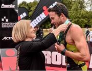 9 August 2015; Denis Chevrot, France, is presented with his gold medal from Lord Mayor of Dublin, Críona Ní Dhálaigh, after he fought off stiff competition to take the gold medal at today’s inaugural IRONMAN 70.3 Dublin. Dublin City Council hosted the competition which saw over 2500 athletes complete a 1.2 mile swim in Scotsman’s Bay in Dun Laoghaire, before mounting their bikes to travel through Dublin and west of the city for a 56 mile cycle, to return to the Phoenix Park for the 13.1 mile half-marathon.    1,500 Irish athletes took part in today’s event and 1,000 international athletes from 40 countries travelled to Dublin to compete in the gruelling competition. Chesterfield Avenue, Phoenix Park, Dublin. Picture credit: David Maher / SPORTSFILE