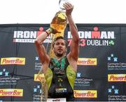 9 August 2015; Denis Chevrot, France, fought off stiff competition to take the gold medal at today’s inaugural IRONMAN 70.3 Dublin. Dublin City Council hosted the competition which saw over 2500 athletes complete a 1.2 mile swim in Scotsman’s Bay in Dun Laoghaire, before mounting their bikes to travel through Dublin and west of the city for a 56 mile cycle, to return to the Phoenix Park for the 13.1 mile half-marathon. 1,500 Irish athletes took part in today’s event and 1,000 international athletes from 40 countries travelled to Dublin to compete in the gruelling competition. Chesterfield Avenue, Phoenix Park, Dublin. Picture credit: David Maher / SPORTSFILE