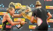 9 August 2015; Susie Cheetham, right, Great Britain, celebrates with second place Samantha Warriner, left, New Zealand, after fighting off stiff competition to take the gold medal at today’s inaugural IRONMAN 70.3 Dublin. Dublin City Council hosted the competition which saw over 2500 athletes complete a 1.2 mile swim in Scotsman’s Bay in Dun Laoghaire, before mounting their bikes to travel through Dublin and west of the city for a 56 mile cycle, to return to the Phoenix Park for the 13.1 mile half-marathon.    1,500 Irish athletes took part in today’s event and 1,000 international athletes from 40 countries travelled to Dublin to compete in the gruelling competition. Chesterfield Avenue, Phoenix Park, Dublin. Picture credit: David Maher / SPORTSFILE