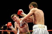 18 December 2008; Paul Hyland, left,  in action against Eugene Hegney during their Bantamweight bout. Frank Maloney promotions, Paul Hyland v Eugene Hegney, The Helix, DCU, Dublin. Picture credit: Ray Lohan / SPORTSFILE *** Local Caption ***