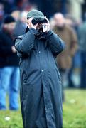 21 December 2008; Racing fan Charlie Fanning, from Dublin, watches the Holy Cross Novice Handicap Hurdle. Thurles Racecourse, Thurles, Co. Tipperary. Picture credit: Matt Browne / SPORTSFILE