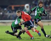 28 December 2008; Keith Earls, Munster, is tackled by John Muldoon, Connacht. Magners League, Connacht v Munster, Sportsground, Galway. Picture credit: Brendan Moran / SPORTSFILE