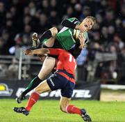 28 December 2008; Gavin Duffy, Connacht, is tackled in the air by Doug Howlett, Munster. Howlett was subsequently sent to the sin-bin as a result of the tackle. Magners League, Connacht v Munster, Sportsground, Galway. Picture credit: Brendan Moran / SPORTSFILE