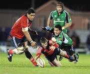28 December 2008; Ian Dowling, Munster, supported by team-mate Nick Williams, gets to the ball ahead of Niva Ta'auso, Connacht. Magners League, Connacht v Munster, Sportsground, Galway. Picture credit: Brendan Moran / SPORTSFILE