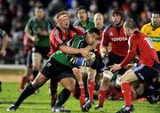 28 December 2008; Niva Ta'auso, Connacht, is tackled by Mick O'Driscoll, Munster. Magners League, Connacht v Munster, Sportsground, Galway. Picture credit: Brendan Moran / SPORTSFILE