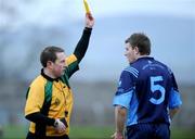 3 January 2009; Joe Scully, Tralee IT, is the first player to be sent off under the new rules by referee Derek O'Mahoney after receiving two black books and then being shown the yellow card. McGrath Cup, Waterford v Tralee IT, Fraher Field, Dungarvan, Co. Waterford. Picture credit: Matt Browne / SPORTSFILE