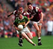 24 September 2000; Tomas O'Se of Kerry in action against Sean Og de Paoir, left, and Sean O'Domhnaill of Galway during the All-Ireland Senior Football Championship Final match between Kerry and Galway at Croke Park in Dublin. Photo by Ray McManus/Sportsfile