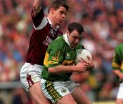 24 September 2000; Seamus Moynihan of Kerry in action against Niall Finnegan of Galway during the All-Ireland Senior Football Championship Final match between Kerry and Galway at Croke Park in Dublin. Photo by Ray McManus/Sportsfile